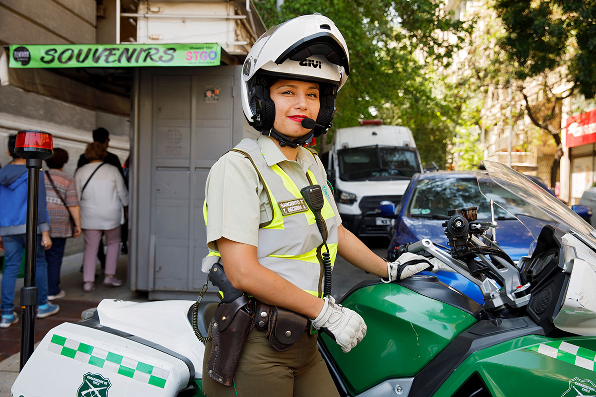 Sergeant Becerra of the Carabineros de Chile manages traffic and patrols near La Moneda Palace in downtown Santiago. 